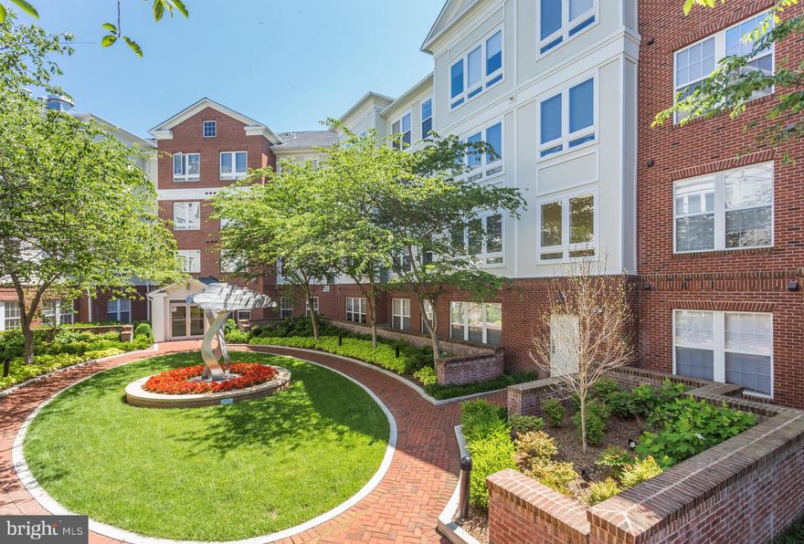 Welcome Home! This spacious one bedroom plus den condo is move-in ready and waiting for you. Built in 2005, and gently lived in by the current owner, it feels just like new! You can enjoy all the modern amenities and low maintenance lifestyle. The spacious kitchen is open to the living and dining rooms and there is plenty of natural light. The main living areas has upgraded crown moulding for added elegance. Working from home is a breeze with the large den (big enough for a second bedroom). The master is complete with an ensuite bathroom, walk-in closet and bonus sitting area. Newer (2018) hardwood floors throughout. Newer (2021) washer/dryer in unit! HVAC replaced in 2019. Reserved garage parking included. Condo fee includes fitness center, on-site management, master insurance, snow removal, trash, water. Close to Route 50, DC, National Airport, Pentagon & Amazon HQ. Minutes to Crystal City, Old Town Alexandria, Rosslyn, Courthouse and Ballston. Plenty of parks and trails nearby such as the W&OD trail, Glencarlyn Park and Tyrol Hill Park. Enjoy many shops and restaurants, live theater and movie theater in nearby Shirlington or just blocks from all the convenience of the Columbia Pike corridor.