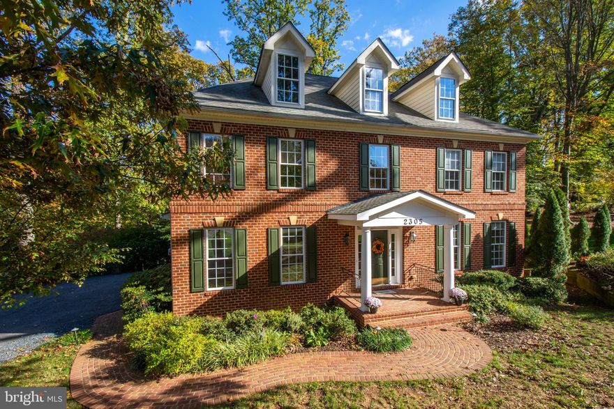 Welcome to 2305 Annapolis Ridge Court - a stunning, center hall colonial in a lovely wooded setting. This home has it all, five bedrooms, four full and one half bathrooms, gourmet kitchen, formal dining room, office on the main level, enormous owners suite with dual walk-in closets and a fully finished basement with bar and a media room/workout area.  An entertainers dream with a flowing floor plan,  this house is perfect for everyday living and large gatherings.  Much of the home has been freshly painted and has redone hardwood floors on the main level and new carpeting on the main level and owners suite. Outside there is an irrigation system and lovely slate patio for entertaining. Situated in a convenient location with restaurants and shopping within walking distance, 2305 Annapolis Ridge Court is a great place to call home!