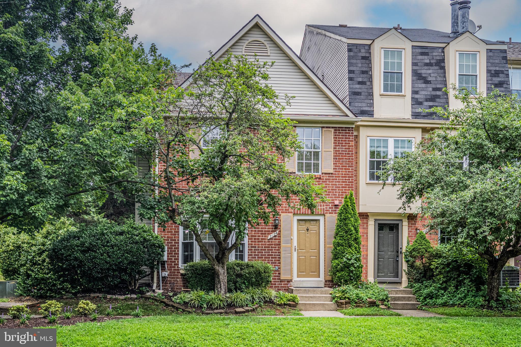 This rarely available brick end unit townhouse faces a large beautifully landscaped and well-maintained community open space in the sought-after Wildwood Hills neighborhood of Bethesda near Montgomery Mall and the Cabin John area. Besides the fantastic location and proximity to public transportation, restaurants and shopping, a few other highlights of this home include a brand-new roof, new gutters with leaf guards and new fascia boards wrapped in aluminum, recently remodeled kitchen and baths and newly replaced front bay window and storm door. The side entry sliding glass door supplies tons of natural light to the sleek kitchen with upgraded appliances, Quartz/marble style countertops and white shaker style cabinets against a grey subway tile backsplash. There is a conveniently located powder room upon entry for guests and a separate main floor laundry/utility room with an updated washer and dryer set. The HVAC and HWH are both under 10 years old. You will enjoy one assigned parking spot (#103) just steps away from your door and plentiful visitor parking. A wooded area and playground sit just around the corner for your enjoyment. The upstairs boasts 3 well-appointed bedrooms and two full baths with quartz vanities and marble tile with glass shower doors. The primary bedroom has a large walk-in closet with built-ins. HOA fees are only $134 a month paid quarterly. Quite a value in quite a location!
This unit has had prior approval for a side patio/deck of up to 4.83' deep from the side entry sliding glass doors. No minimum on width was noted other then the lot size and it being contingent on the owner planting and maintaining screening bushes facing the street area.