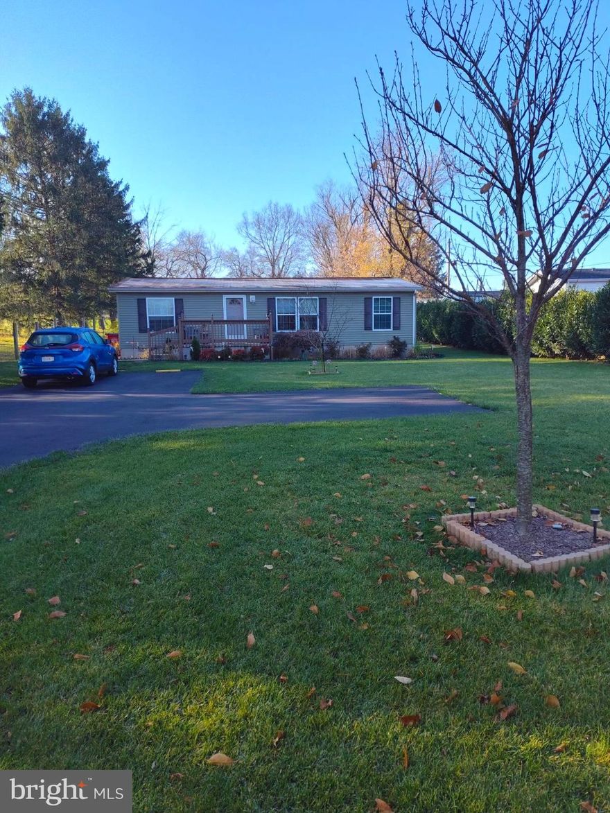 ****Professional photos will be upload Friday 11/24***** Welcome to this charming 3-bedroom, 2-bath home with a convenient one-level layout. Enjoy the spacious interior and the lovely yard for outdoor activities. Beautiful landscaping, convenient location.  This home is a double wide on a permanent foundation should go all loan programs. Don’t miss this amazing property. Schedule your showing today