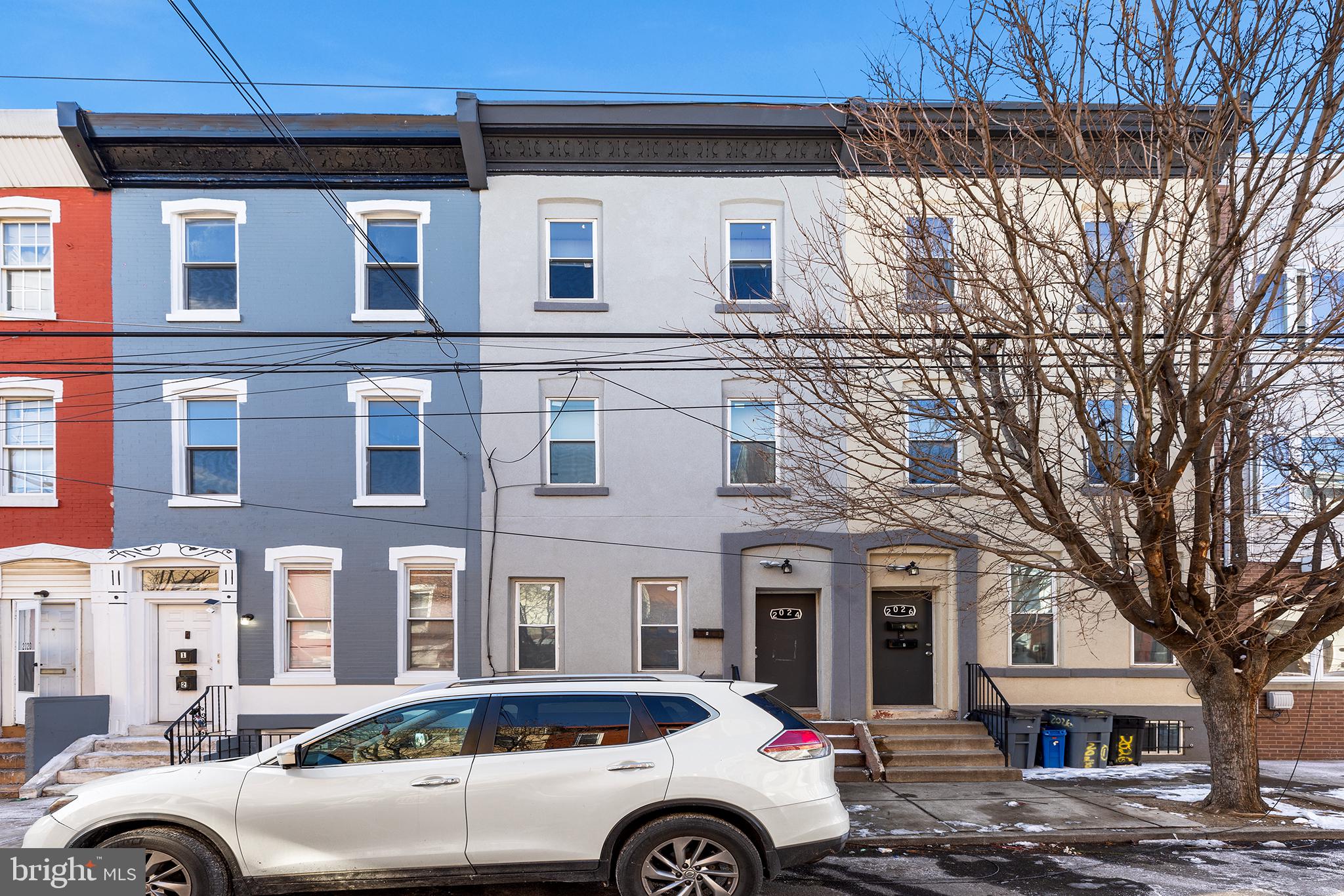PRICE IMPROVEMENT: Amazing Investment Opportunity in Booming Multifamily Market! This newly renovated Duplex zoning RM-1 perfectly located just a few blocks from Temple University in the thriving 19122 zip code. The property includes a large buildable lot, accessible on N Darien St that offers endless possibilities, such as building an additional dwelling, a parking space, BBQ area, or outdoor entertainment space. This property has been meticulously rehabbed from top to bottom. Unit 1 boasts a modern kitchen, 2 spacious bedrooms on the main floor, each with its own full bathroom. The basement features an additional room that can be used as office, full bathroom, laundry area, and office space. Unit 2 is a Bi-Level Luxury offering a stylish kitchen, 2 generous bedrooms with full bathrooms, and a spacious master bedroom with full bath on the third floor. Enjoy the convenience of having a private bathroom accessible from your bedroom. With the potential for rental income, you can live in one unit and let the tenants pay your mortgage. Located near Temple University, this property offers easy access to public transportation via the Temple University Regional Rail Station. You may also be eligible for a $10,000 grant to cover closing costs. Buyers and buyer's agent to verify with the township for approved uses of the lot on the back. The area is also experiencing a surge in new construction, further enhancing the neighborhood's appeal and potential for long-term growth. Don't miss out on this exceptional investment opportunity. Reach out to the agent to schedule a showing and take the first step towards owning this incredible property.
