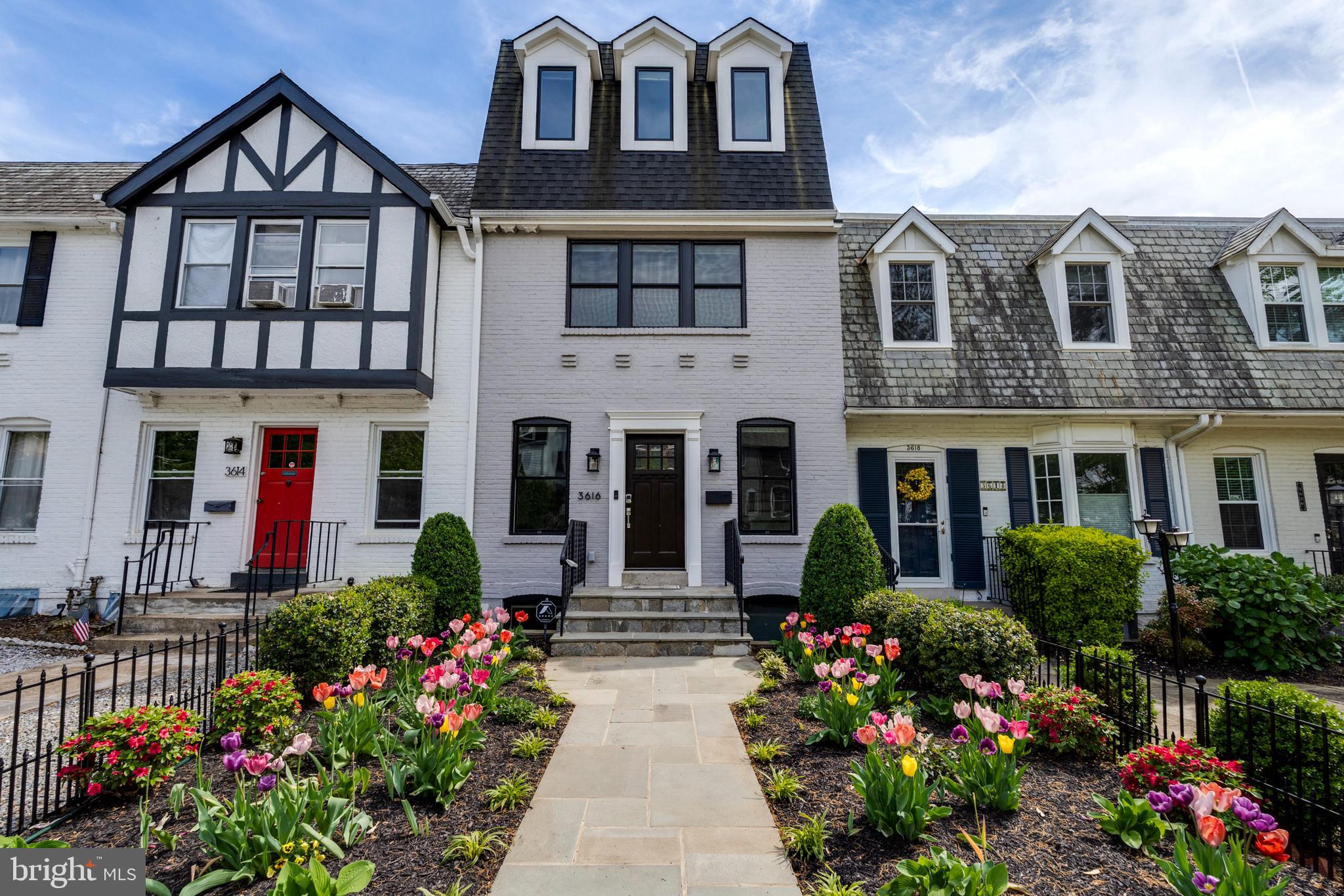 FULL SIZED TWO CAR DETACHED GARAGE. Welcome to this timeless and impeccably maintained rowhome in Burleith. Thoughtfully redeveloped by HAS Builders in 2018, this 5 Bedroom 5.5 Bath + ELEVATOR home has everything you could possibly desire within walking distance of Georgetown. Every bedroom has an en-suite bathroom. No expense was spared in this development and the materials go far beyond what you typically see with stunning crown molding and carpentry details in every room, genuine marble countertops and bathroom tile, designer wallpaper, and millwork coffered ceilings. The main level is perfect for entertaining with a living room, family room, dining room, and chef's kitchen all hooked up to the whole house SONOS audio amplifier system. The fully-finished walkout basement includes a separate kitchen, gym, and bedroom with an egress window and full bath. The home office of your dreams resides on the third floor with a private balcony and espresso bar.
Take in views of green parks and city landmarks on the stunning private rooftop terrace complete with an outdoor TV and gas fire pit. The home includes two balconies and a private backyard patio.
This home is one of only several in the neighborhood to have a true detached two-car garage complete with an electric charger. It can fit two full sized SUV's. Don't miss your opportunity to purchase this breathtaking home.