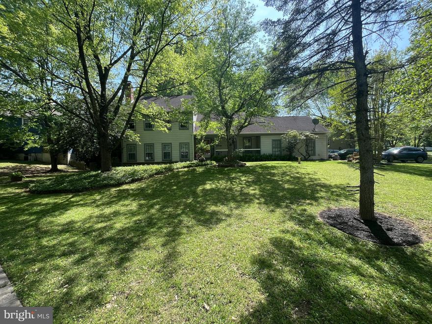 Huge Price Reduction!  Discover your dream home in the highly sought-after Strathmore at Bell Pre subdivision.  This property is on a 1/3-acre corner lot amidst a generous front yard. The backyard is fully fenced and features a screened porch with a hot tub and a spacious deck. 

As you step inside, you'll be greeted by an inviting open floor plan that connects the living room, separate dining area, and kitchen.  There are hardwood floors throughout.  The kitchen has stainless steel appliances, new countertops, ceramic floor tile, and is freshly painted.  The cozy family room is adorned with a charming fireplace. The first floor also features a bedroom, a full bathroom, and a laundry room.  The basement is open with space to design your entertainment area, and room for plenty of storage.  The upper level consists of three bedrooms and two full baths.  There is also a side-load two-car garage with ample driveway parking space.

Perfectly located, this home is approximately one mile from the Glenmont Metro station, only minutes from the ICC, and just a short drive to shopping and dining. The vibrant community amenities include a swimming facility, tennis and pickleball courts, and plenty of open parks, picnic areas, play areas, and trails, ensuring there’s always something to enjoy in the community.

Seize the opportunity to become the next proud homeowner and experience the unparalleled lifestyle that the Strathmore at Bell Pre community offers! The property is sold "As Is".