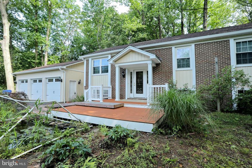 This home is in the heart of Hughesville and the Tri-county crossroads.  4 Bedrooms with 3 full baths on Approx. 1.5 acres. Small desired neighborhood with  lots of charm.  This home has a detached 3 car garage for someone with lots of Toys and/or hobbies for their storage needs.  One Bay is capable  of install Lift. Outside deck for relaxation and wooded area in backyard.  New roof and gutters less then a month old. Koi pond included. There is also a handicap ramp and elevator lift to the main floor.  Upgraded kitchen and baths. Schedule a showing with me today.