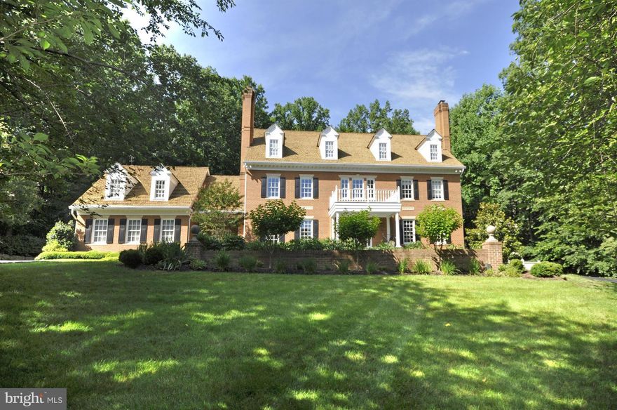 Stunning colonial on 4 luxurious levels! Wonderful layout w/ large public rooms, cherry-paneled study, chef's kitchen, main level guest/in-law suite, expansive master suite, large, finished third level w/ BR, FB & FB. Walkout LL with large rec room, gym & full bath. Backyard w/ a pool and cabana w/ outdoor fireplace. Extensive upgrades inside & out. Recently re-landscaped. 3-car garage.
