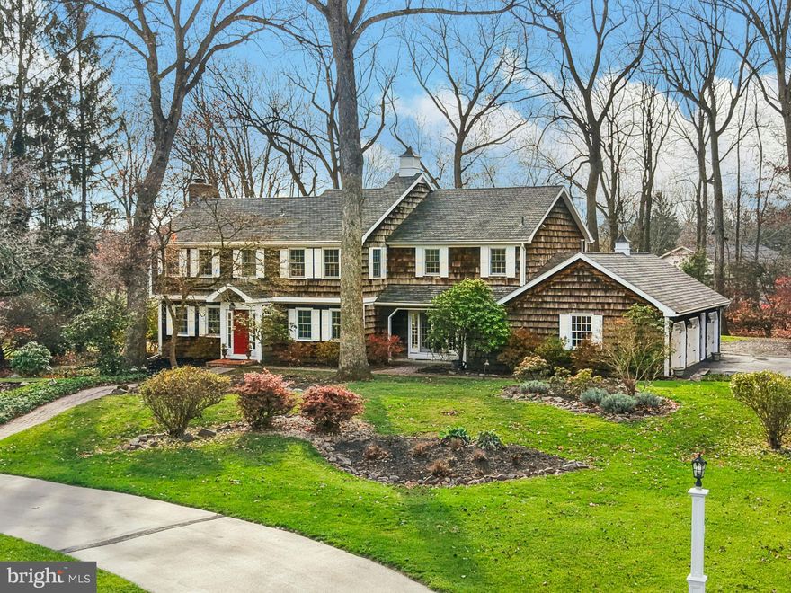 SUNDERLAND: In a distinguished neighborhood, veiled from the view of casual passerby, this stunning home will steal your heart. An optimal blend of style and tradition, this captivating home offers a classic New England exterior, circular driveway, and picturesque setting surrounded by mature trees and landscaping.
Prominently positioned on an acre in the heart of Saucon Valley, the main floor was completely reimagined by the current owners, adding additions and creating an open floor plan with high ceilings, detailed moldings and voluminous windows in generously sized living areas. At the heart of the main level is a beautifully appointed kitchen and breakfast room, opening to an expansive dining room with fireplace and inviting family room. Custom appointments abound.
Four second floor bedrooms include the primary suite addition with cathedral ceiling and a luxurious bath with jetted tub, and custom shower with 6 body sprayers. Bonus space in the finished lower level is ideal for gatherings, game tables and exercise space, while also offering plenty of storage and workspace.
Whether entertaining, enjoying family time or just relaxing – this home has been designed with every lifestyle in mind.  A 3-car garage and an acre of luxurious landscaping, with putting green, are irresistible extras.