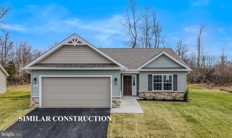 Experience exceptional single-level living in The Lakes at Martinsburg, one of Berkeley County’s desirable new home communities. This brand-new single level home features approximately 1,650 finished sq. ft of living space, a spacious 2-car garage, and a beautifully flat lot, approximately 1/4 of an acre—perfect for easy outdoor enjoyment. Inside, you’ll find 3 bedrooms, 2 full bathrooms, and a dedicated laundry room with upgraded cabinetry for organized storage. The kitchen showcases upgraded white cabinetry, durable quartz countertops, and modern LVP flooring throughout—no carpet anywhere, offering low maintenance and high style. The covered rear patio extends your living space and is ideal for relaxing or hosting gatherings.
Located on the north side of Berkeley County, WV, this home offers excellent convenience for Maryland commuters, with quick access to major routes and everyday amenities. Enjoy the added advantage of lower West Virginia real estate taxes compared to Maryland, making this an appealing option.
Community amenities are a true highlight, including a fenced-in dog park, a fenced playground, and a covered pavilion picnic area—perfect for outdoor leisure, fresh air, and year-round enjoyment.

Special Incentive: The builder is offering closing cost assistance when using the preferred lender. (Borrowers must qualify.)

The photos depict a similar construction home completed in 2025. The floor plan will be the same, including the rear covered patio, but the front elevation and color scheme will vary.