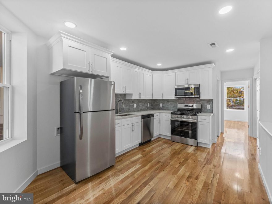 Welcome to Modern Living in Desirable Overbrook!  Step into this meticulously fully updated, two-bedroom apartment situated in the highly sought-after Overbrook neighborhood of Philadelphia. The brand new kitchen features white shaker soft closed cabinets, elegant countertops, gray subway tile backsplash, and a full suite of stainless steel appliances. The newly renovated bathroom maintains the same luxurious finish. Enjoy premium features throughout, including brand new hardwood floors, recessed lighting, central air conditioning, and convenient in-unit washer and dryer. Both bedrooms include ceiling fans for added comfort. To top it all off, you’ll enjoy the convenience of guaranteed off-street parking. With close proximity to all neighborhood amenities, this unit is truly exceptional. This unit is Section 8 approved.