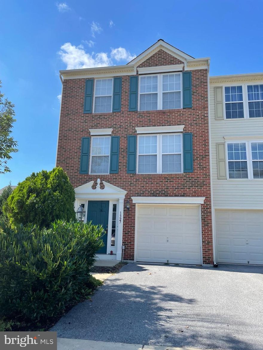 Light and bright 3-level brick end unit townhome in Fairfax Crossing. This floorplan has the 3-level extension which makes for an expanded lower level rec room, a mid level sunroom off the kitchen, and an expanded master bedroom on the upper level.  Newer roof and hot water heater.
