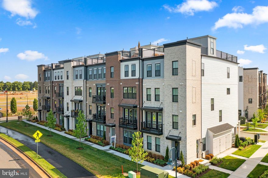 Looking for a new home without the wait? This brand new COLLIER II TOWNHOME-STYLE CONDOMINIUM is available IMMEDIATELY. Closing Cost Assistance available when working with Intercoastal Mortgage and Walker Title! <br>

</br>With 2,023 finished square feet on 4 levels, this newly completed COLLIER II floorplan by Van Metre Homes offers 3 BEDROOMS, 2 FULL and 2 HALF BATHROOMS, a 1-CAR GARAGE AND A ROOFTOP TERRACE. With an abundance of natural light, the MAIN LEVEL showcases a spacious heart-of-the home kitchen featuring upgraded cabinets, quartz countertops, stainless steel appliances, and wide luxury vinyl plank (LVP) flooring. This townhome-style condominium features an impressive primary suite with a walk-in closet and a luxury bathroom with double sinks and large frameless shower enclosure with a built-in seat. Move the living space outdoors with the large rooftop terrace…perfect for entertaining friends and watching sunsets. This designer-curated home features a convenient lower-level mud room and an impressive main level great room with a deck conveniently located off the kitchen. Experience a home that lives like a townhome, but has the low-maintenance, easy lifestyle of a condominium. <br>

</br>DEMOTT & SILVER, a Van Metre community offering townhomes and townhome-style condominiums in the master-planned community of Broadlands, is located within walking distance of Metro's Silver Line and the area’s most desirable conveniences, Demott & Silver puts you within minutes of everything Ashburn offers. With access to pools, green spaces, miles of hiking and biking trails, shopping, restaurants, Metro’s Ashburn Station, a bus stop, and nearby commuter routes, Broadlands’ newest neighborhood is anticipated to become a community second-to-none<br>

</br>VAN METRE HOMES has been in business for 65+ years, knows how to treat customers and is recognized for commitment to quality, energy efficiency and customer warranties post-settlement. The limited warranty not only covers warrantable items your first year in the home, but mechanical parts of the home for the 2nd year and a 10-year structural warranty. Experience the peace of mind associated with purchasing a new, never-been-lived-in Van Metre home. <br>

</br>*Pricing, incentives and homesite availability are all subject to change without notice. Images, renderings and site plan drawings are used for illustrative purposes only and should not be relied upon as representations of fact when making a purchase decision. For more information, see a Sales Manager for details. The TOTAL of the monthly HOA dues and monthly condo dues is $351.03.<br>