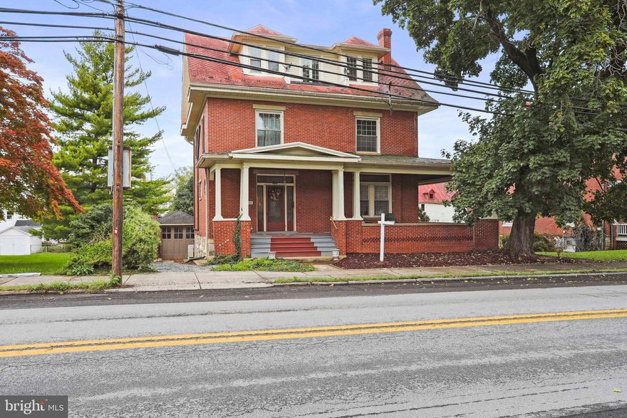 SHOWINGS STILL WELCOME. (House is under contract but with a kick out.)  Amazing historic home built in 1907. 3 floors of beautiful woodwork with a touch of modern updates to combine old and new. Featuring 6 bedrooms and 2 1/2 fully updated bathrooms.  

Under the current ownership, the house has seen it's beauty restored and enhanced. The entire kitchen was gutted and transformed into a chefs desire.  New cabinets, tiled flooring, granite counter tops, new appliances, kitchen island and style galore.  The owners also invested in 6 Mitsubishi mini split units to heat and cool all 3 levels.

The main floor is designed for comfort, entertaining or snuggling up to watch movies. The front family room is connected to the large dining room with the original pocket doors.  The gourmet kitchen is in the rear and is positioned right off of the sun room.  Wait until you get a feel for this sun room. It is going to make you want to have a nice cup of morning coffee, bird watch or to sit and enjoy a great book.  

Heading up to the first upper level you will find 4 large sized bedrooms all with hardwood floors and wonderful natural light.  The primary bedroom has it's own en suite and the other 3 bedrooms share the large full bath in the hall.

Continuing up to the top level, you will find another 2 bedrooms.  Use them as bedrooms, an office, playroom for the kids, craft or hobby room.  To top it all off, the rear attic space has been finished and is ready to be anyone's greatest desires.  Make it a reading nook, cool office space, play area or even a fun theater room.

This home also boasts a full unfinished basement for your needed storage or to be used as a gym.  There is a cute covered patio in the rear and an amazing wrap around porch on the front of the house.  

Being that this house is in walk-able distance from downtown amenities, the park and restaurants, you'll find no shortage of convenience here. This house has it all...size, style, comfort and convenience.  Make your showing today!