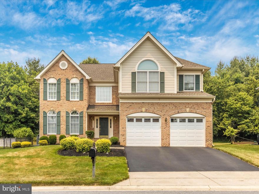 Upgraded and immaculate brick front Toll Brothers Richmond model in sought-after Clarksville Hunt community  delivers high quality updates and a super convenient location minutes from your favorite schools, Maple Lawn, River Hill and Hickory Ridge but without the Columbia Association assessment. Major updates  include screened porch, flagstone patio,  the roof with transferrable warranty, six inch gutters, mechanicals and much more.  The bright and open floor plan  includes soaring ceilings and windows, 3,518 finished square feet above grade, gleaming wood floors,  a beautiful kitchen with a bright garden window, a center island and yards of impressive level five Calacatta Valentin quartz tops with matching full backsplash throughout .  You'll appreciate the large single bowl stainless undermount sink, matching upgraded stainless steel GE Profile appliances highlighted by the five burner gas range, built-in microwave & French door refrigerator with water and ice service. You'll also  find 42" cabinetry, the essential pantry and ample recessed lighting. The main level includes nine foot and double-volume ceilings, an in-home office, laundry room, a dramatic living and dining room washed in natural light and calming color selections. The family room includes a custom, hand built natural stone hearth fireplace with remote controlled 40,000 BTU NG insert. The private bedroom level features a surprisingly spacious primary suite with a sitting room, large closet, ceramic bath with a private water closet,  separate shower,  a soaking tub plus a dual sink vanity. There are three balanced secondary bedrooms each with a wide wall closet and ceiling fan, ceramic hall bath, linen storage and  attic access. The sunny, expansive finished lower level offers a spacious guest or live-in suite with a full bath and the ultimate entertainment area with surround sound  for movie or game night, plus an exercise area and lots of room to play.  This level includes great storage and  outdoor access. The squeaky clean garage was customized (as-built) by removing the center support column for easy vehicle access. The time saving location offers options for outdoor fun, including the nearby Robinson Nature Center and Schooley Mill Park. Best of all is proximity to popular dining, schools, quick access to major commuter routes (32, 29, 108 & 95). Maple Lawn,  the JHU/APL Campus, high-tech employment, Ft Meade, NSA and the hospital.  Beautiful level lot.