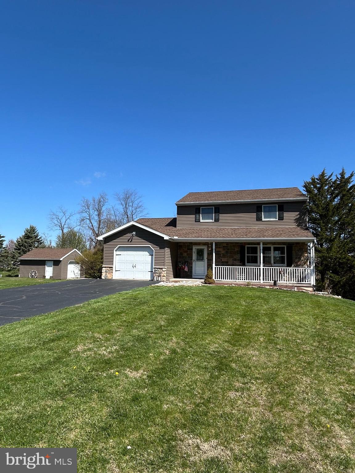 *Highest and best offers are due by Saturday 4/26 at 10 a.m.* Welcome to serene living at 44 High View Lane in the Brandywine Heights Area School District! Open the door of this well-maintained 2-story Colonial home on a peaceful, rural road in Mertztown and you will discover a spacious living room, a large kitchen with granite counter tops and backsplash and a dining area, a cozy room with a pellet stove, and a half bath. There is an attached one car garage which can be accessed from the dining area. The second floor features a large, updated bathroom and three generously sized bedrooms. There is great potential to create additional living space in the unfinished, water-sealed basement which leads directly out onto the patio. There is even potential to add a bathroom with a shower drain in the basement as well. This home sits on .9 acres, so there is plenty of room for outdoor entertaining, including on the wood deck, on the cement patio, and on the covered front porch. The roof on the home was replaced and the shed was built in 2014; plus, the hot water heater is brand new and a generator was added in 2013. This property is move in ready with so much to like. Don't miss out!!