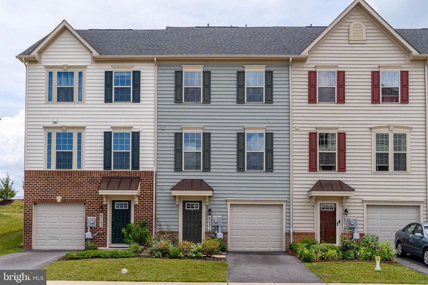 Beautiful interior townhouse  with 1 car garage that walks into a large finished basement.  Main level has huge kitchen with oversized island, eat-in area,  living room/ sitting room and half bath.   Enjoy 3 bedrooms and 2 full bathrooms on 3rd level with laundry room!  4th level has additional bedroom or game room with full bath as well as a roof top deck overlooking your fenced backyard and an amazing view of the Oakdale High School football field!  Easy access to I70 and 270 and all that downtown Frederick has to offer.  Water/sewer included in rent!