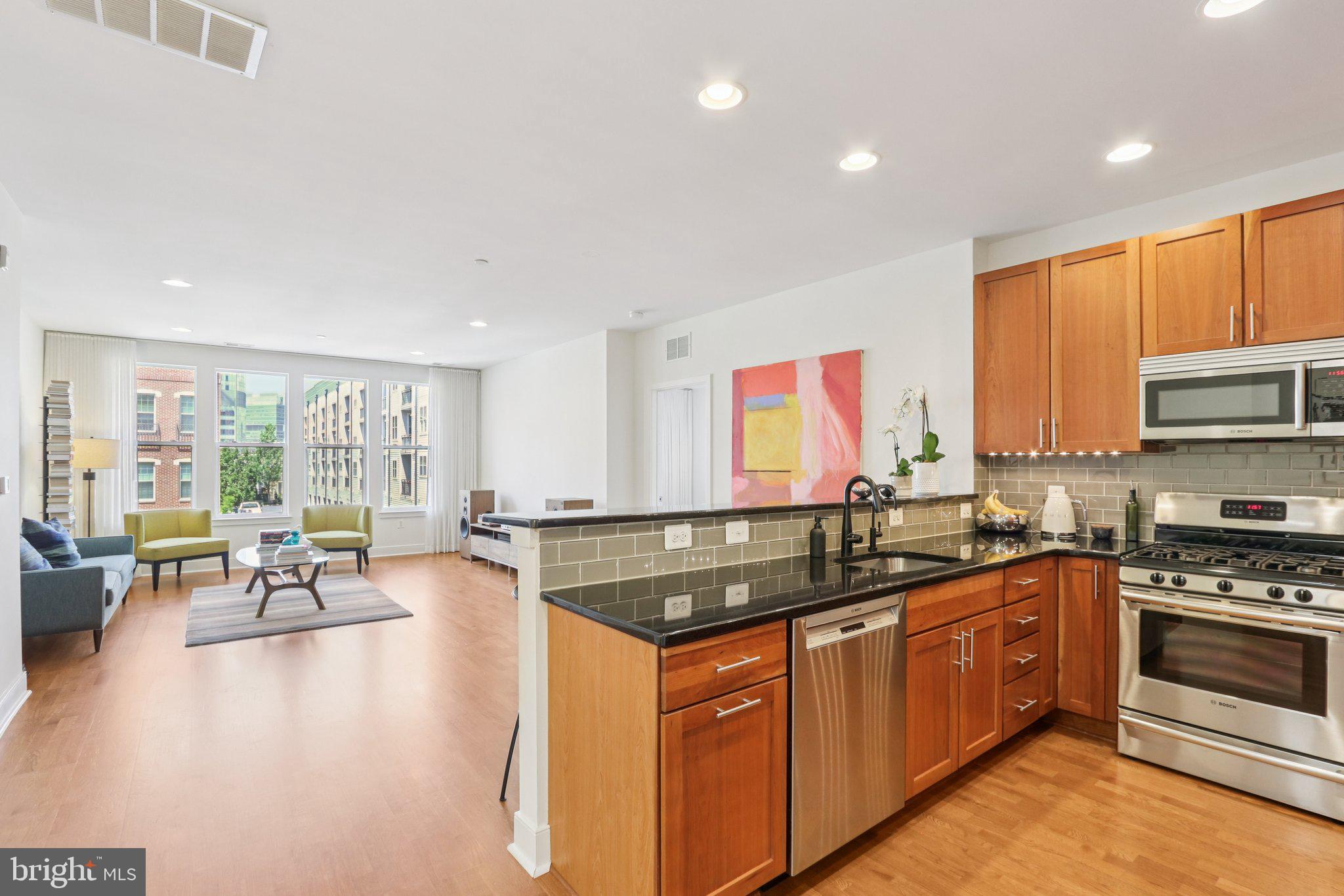 Welcome to this sunny, immaculate condominium offering 2 large bedrooms, a versatile den/home office, and 2 full baths—all in the coveted A+ Fitler Square/Graduate location.
Enjoy modern elegance and thoughtful upgrades throughout, including a custom California Closets walk-in in the primary suite, designer window treatments in every room, a 50+ bottle wine/beverage cooler, and a reverse osmosis water system for pristine drinking water.
The kitchen is equipped with stainless steel appliances, classic Shaker cabinetry, a pantry, stylish backsplash, and a breakfast bar—perfect for both everyday meals and entertaining. Both bathrooms are beautifully appointed and well-maintained.
Located in a well-managed, pet-friendly building, amenities include a fitness center, on-site maintenance, and both indoor and outdoor parking (unit #204 includes an indoor garage space).
This unit faces the tranquil courtyard, offering quiet privacy just steps from the lively corner of 24th & South. Walk to top restaurants, cafes (Rival Bros Coffee, Rowhome Coffee), grocery stores (Heirloom Market, South Square), and more. You’re also just minutes from Schuylkill River Park, with its playground, dog park, tennis courts, and scenic trail access. It’s a quick walk to Rittenhouse, University City, University of Pennsylvania, CHOP, and public transit. Close to 30th Street Station and all major highways.
NOTE—This is an awesome building. The condo association just approved a complete lobby renovation to be completed by early fall. It will be funded entirely with existing funds so no assessment to owners-- a material benefit to all owners (and buyers!) at no additional cost.