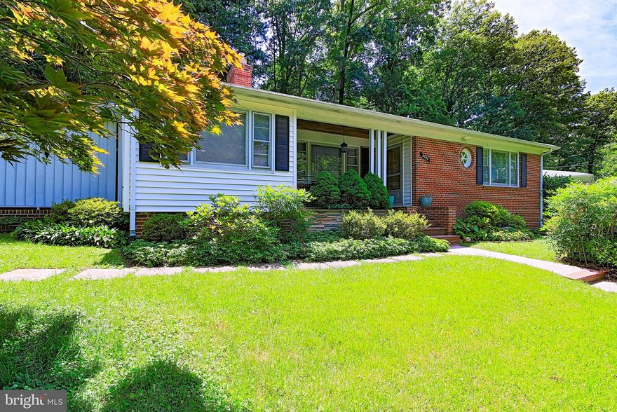 Offers Deadline Tuesday 7/6 at 4 pm.  Please GCAAR Contracts with Financial information and Lender's letter. 
Gold mine! Nestle your family  in the upscale Bethesda park-like settings, on wide, near half acre lot, with tiered organic gardens, serene layered landscaping, and across the park. Original architect mid-century brick raised rambler, quality built and meticulously cared for, in the highly sought after area of lavish mansions and ambassadorial residences, is located in the Walt Whitman cluster of finest schools  (Burning Tree ES and Thomas Pyle MS). The front porch offers 2 entrances - the main door leading to the Foyer, and a separate door to the Home Office. There are 3 additional doors off the patio to enter the home without taking steps up, plus another entrance through the carport (which also serves as a separate exit from the Home Office).  The Main Level is complete with 3 Bedrooms and 2 full-Baths, including the Master Suite, Dining and Living room combo with a wood-burning fireplace, Kitchen and autonomic Home Office. The Lower Level boasts by 36 feet long Family/Rec/Game/Pool Table Room with a gas fireplace and a bar counter (perfect for unwinding and playing video games), an Au-Pair Suite, Home Gym, laundry and storage rooms. Outside, a  fully fenced, private backyard, backing to the parkland, with array of stone walls, built-in fireplace, brick water fountain off the patio, ample parking on the artful brick & concrete driveway with a carport, provide great space to relax, entertain, enjoy outdoors or go camping  just off the upper gate. All within minutes to Downtown Bethesda/DC, NIH, Suburban Hospital, Walter Reed Center, Metro, Montgomery Mall, Chevy Chase and Tysons Corner shopping, I-495, I -270, 3 international airports. Enjoy the Old World charm or expand with a modern twist - the choice and rewards are yours!