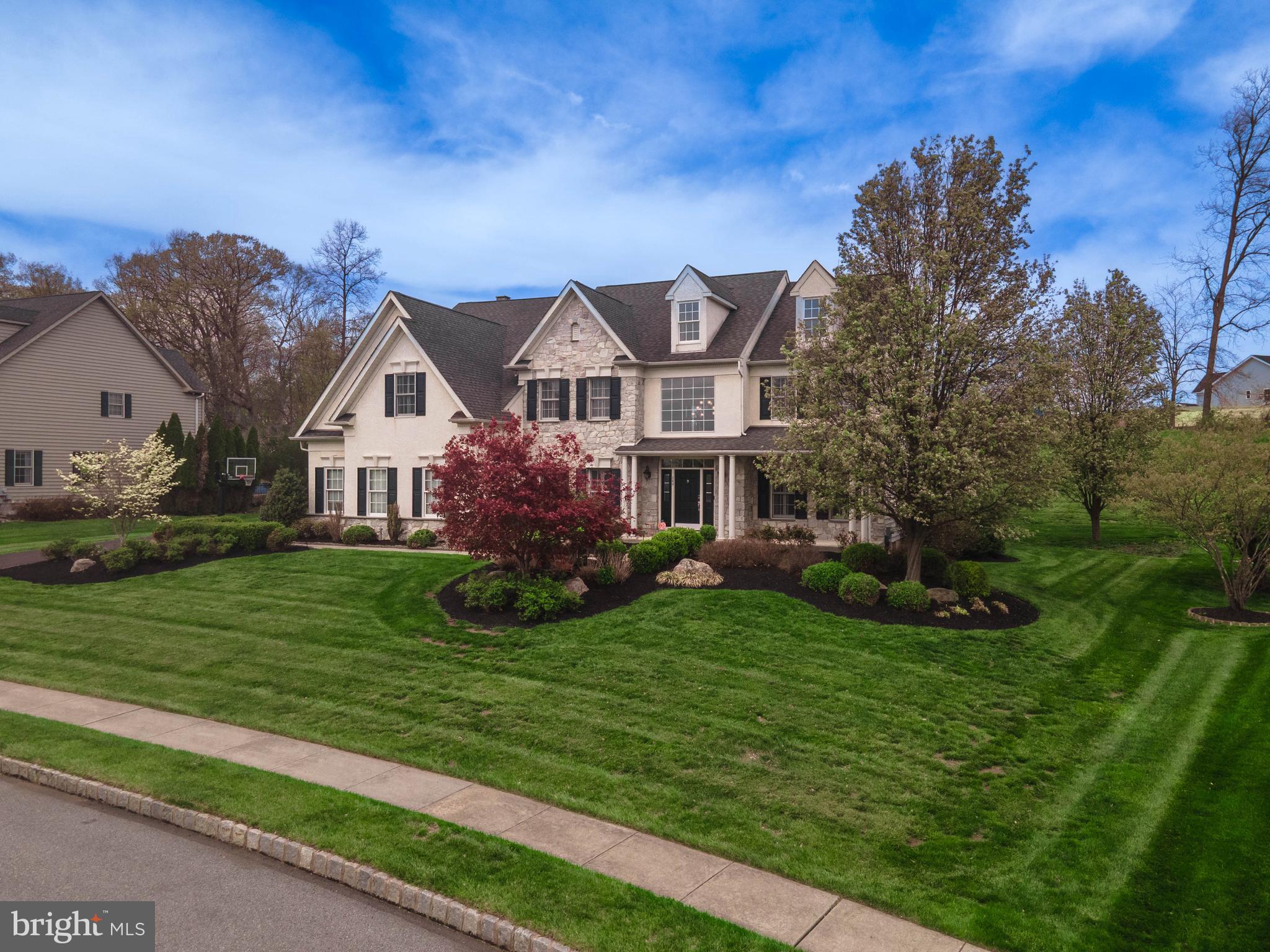 A truly impressive 4 BDR, 3.5BA 3 Car Side Entry home awaits! NO HOA FEES! Ideally located in Estates of Faraway Farms West, Upper Providence Twp. in Spring-Ford SD. Gas Heat & Cooking. Public Water & Sewer. An inviting Two Story Foyer greets you with a dramatic curved staircase, hardwood flooring and palladium window that allows natural light to stream through the home. Main Floor Nine Foot Ceilings. For those that work from home, you'll appreciate the Private First Floor Study ideally located with Plantation Shutters and a Double Door Entry. The Living and Dining Room flow beautifully together with hardwood flooring accented with Crown Molding. Gorgeous Kitchen with 42" Cabinets, Granite Countertops with Tile Backsplash, Island with Electric and overhead Pendant Lights, Recessed Lights, Gas Cooktop, Double Oven (great for those holidays and gatherings), Built-In SS Microwave & Dishwasher AND Refrigerator(included). Slider from the Kitchen Breakfast Room leads to a relaxing Patio. Fabulous Two Story Family Room with a Wall of Windows and Woodburning Stone Surround Mantled Fireplace. Hallway Powder Room. Main Floor Laundry with Overhead Cabinets and Laundry Tub. Easy access to the Three Car Garage with Newer Doors from the Laundry Room. The Double Staircase gives easy access from the family room and foyer to the upper level. The Upper Level has 4 Generous Sized Bedrooms with Spacious Closets and Three Full Baths. Double Door entry leads into the Primary Bedroom with a ceiling fan, sitting room has a Tray Ceiling and an Extra Large Must See Walk-In Closet. The Primary Bath with a Double Vanity, Linen Closet, Private Toilet Room, Shower and Soaking Tub. 2nd & 3rd bedroom have access to a full bath. The 4th Bedroom with a Walk-In Closet has access to the hallway Full Bath. To complete this home, there is a full unfinished basement with a bilco door for outside access. One year home warranty included. Information is reliable but not guaranteed and measurements may not be exact and should be independently verified by the Buyer. A Beautiful Home Awaits!