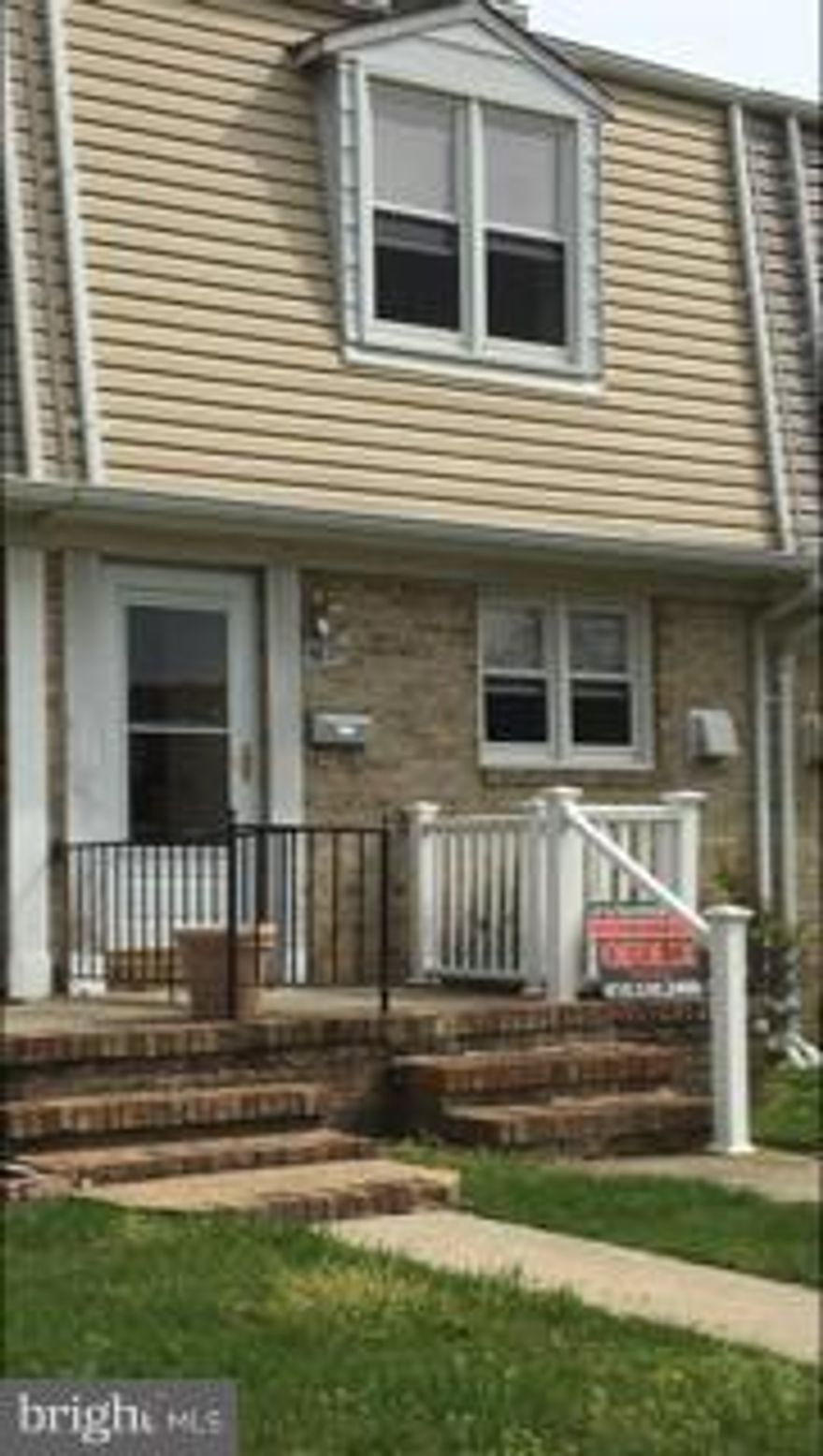Great opportunity to get into this 3 bedroom 2 bath townhouse, finished lower level walk out patio, fenced yard and shed. Wood floors some with carpeting, central air, ceiling fans, eat in kitchen, dishwasher, 2 refrigerators, gas heat & cooking. Replacement windows.Chair gliders allow accessibility to all 3 levels. double parking pad. Close to shopping, airport, train. Great price in need of TLC