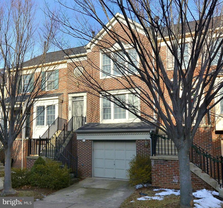 MOVE-IN Now! 3 Story Brick Front TH w/all the Amenities. Expansive LR w/CornerFireplace.Gorgeous hardwood on MainLevel. New StainlessAppl, GraniteC-Tops, Recesed+New Light Fixtures+PantryCloset. Large Deck w/stairs to Backyard Slate Patio. MBR w/En-SuiteBath+Walk-inCloset. 2 Addl Lg BR's all w/newer Carpet. Lg RecRoom+FullBath+Laundry on LowerLev.  ***OPEN HOUSE 1/25/2014   1pm to 4pm***
