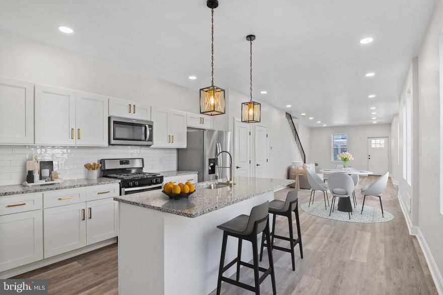 Stunning 4 bedroom, 2 full and one and a half bathroom property now available. Upon arrival, you'll notice a well kept block, front porch and ample street parking on the exterior. From there, a free flowing open concept boasting all natural light, half bathroom, modern kitchen, dining and living room combination on the main level. Next, 4 bedrooms, 2 full bathrooms and tons of closet space upstairs. And finally a finished basement and spacious fenced in rear patio perfect for entertaining friends and family! Could it get any better though? It does! This home also has a new roof, hot water heater, electric, plumbing, windows, flooring and appliances throughout. In addition, it's near all the public transportation you need to make the commute a breeze so make your appointment today before it's too late!