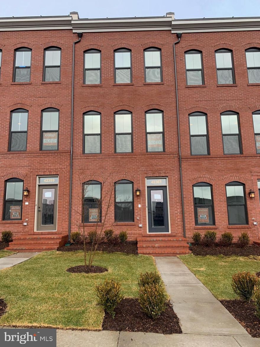 Beautiful 4 level town home for immediate occupancy within walking distance to Brambleton town center. Hardwood floors through out main level. Porch off of 4th level loft.