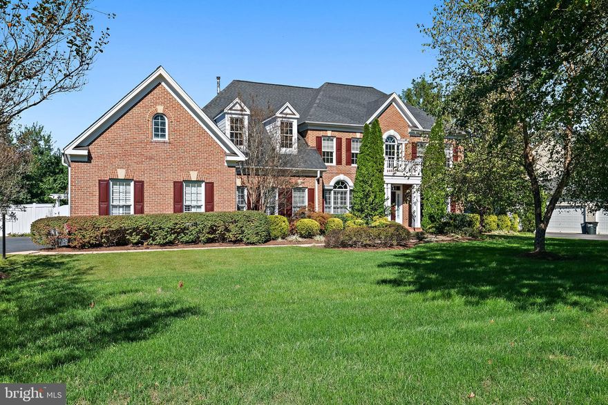 Experience spacious living in the amenity-rich Kingsport community of Annapolis. This home offers over 7,000 sq. ft. of finished space, with freshly painted interiors and new carpet throughout. The fenced rear yard is an outdoor retreat, featuring a heated saltwater pool with tanning ledge, outdoor kitchen, pergola, patio, and extensive exterior lighting and landscaping—perfect for entertaining.
The finished lower level is designed for entertaining with a state-of-the-art theater room, granite kitchenette with SubZero wine fridge and Frigidaire dishwasher, wine closet, gym, game room with fireplace, full bath, and ample storage.
The main level features Brazilian cherry hardwood floors, a dramatic two-story family room with gas fireplace and floor-to-ceiling windows, crown moldings, and a gourmet granite kitchen with stainless steel appliances, KitchenAid double ovens, GE Monogram 5-burner gas range, and a large island. An oversized mudroom/laundry with new LG washer & dryer (2024), wet bar, dual staircases, an en suite first-floor bedroom, and a first-floor office provide added convenience and flexibility.
Upstairs, the primary suite offers a gas fireplace, kitchenette with mini fridge, walk-in closet, and spa-inspired bath with double vanities, Kohler jetted soaking tub, and separate shower. Three additional bedrooms include an en suite and a Jack-and-Jill bath.
Additional highlights include a three-car garage with Tesla charger and overhead storage, geothermal heating and cooling, natural gas generator, ADT security system, and a roof replaced in 2020.
Set across from the community path to Crab Creek with water access and kayak storage, this home also enjoys Kingsport’s amenities: pool, pier, tot lots, kayak racks, walking paths, and tranquil ponds. With easy access to Route 50, Washington, D.C., and Baltimore, this residence blends comfort, function, and convenience—offering a spacious home with outstanding outdoor living.