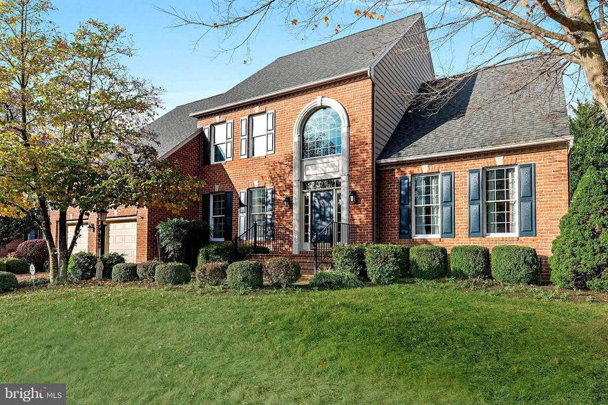 STATELY GRACIOUS & SPACIOUS COLONIAL in the picturesque, water privileged PRESERVE AT BROAD CREEK!  Experience peaceful wooded surrounds mere minutes from major commuter routes, Westfield & Towne Centre Malls, downtown City Dock harbor, and a menu of historic Annapolis’ maritime amenities.  The original owners have meticulously updated and maintained the home for totally TURNKEY OCCUPANCY!  Offering 4BR/2.5BA, the home showcases creatively integrated spaces to fashion to your needs including an open concept Kitchen/Casual Dining/Family Room sharing fireplace ambiance, a glass-encased skylit All-Season Room overlooking tree-backed yard, a highly desirable main level Primary BR Suite, and a full footprint unfinished basement for storage or future customization.  Special Features include: High-efficiency gas insert fireplace/heater; fresh neutral paint palette to enhance any décor; lustrous hardwood floors; walls of custom windows; skilled architectural detailing; whole house generator.  A paver parking pad and 2-bay/2-car garage complete this property package, … AWAITING THE SIMPLE TURN OF YOUR KEY!