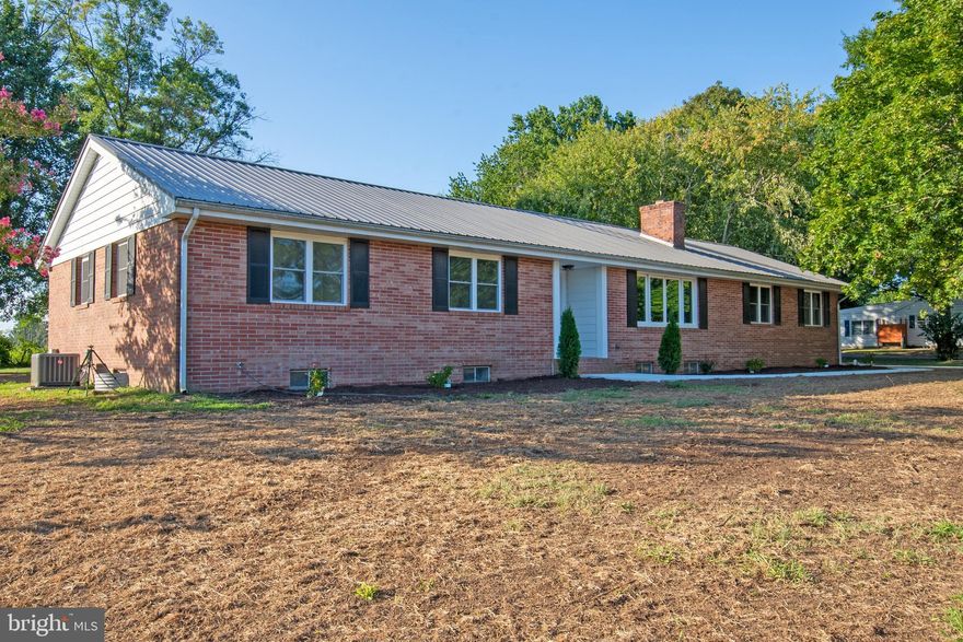 Spring and summer are just around the corner, and this stunning fully brick rancher is ready for its new owners! Completely rehabbed and move-in ready, this beautifully remodeled home features a full basement and a whole-house generator—offering comfort, security, and modern living just minutes from the Delaware Bay, where you can even catch the scent of the salt air.

Step inside to a spacious gathering area with luxury vinyl plank flooring and a cozy brick fireplace—perfect for relaxing or entertaining. The gourmet-style kitchen is a true showstopper with brand-new soft-close cabinetry, granite countertops, stainless steel appliances, pendant and recessed lighting, and a comfortable eat-in space. Sliding glass doors lead to a large rear porch, ideal for seasonal outdoor living and entertaining.

The primary suite offers new LVP flooring and a private bath featuring a tub/shower combo, double vanity, and updated lighting. Two nicely sized guest bedrooms, plus a versatile flex space perfect for a home office, den, or hobby room, provide plenty of living options. Additional upgrades include a brand-new half bath, a full guest bath with walk-in shower, and a full unfinished basement complete with a drainage system.

This home is loaded with practical upgrades including a two-car attached garage, whole-house generator, new standard septic system, new windows and doors, updated HVAC, and some new plumbing & wiring.  Outside, mature shade trees and low-maintenance landscaping complete the convenient setting.  Back yard is perfect for your seasonal garden. 

Ideally located just a short ride to Broadkill Beach or Primehook Beach and minutes to downtown Milton’s community events, farmers markets, restaurants, breweries, and unique shops—plus close proximity to Lewes and Rehoboth. Meticulously remodeled by Cutting Edge Construction, this exceptional home is truly turnkey and ready for its next owner to enjoy.
