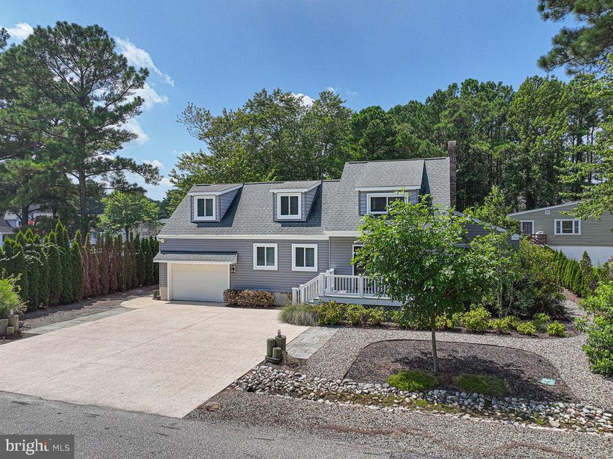 Welcome to your coastal retreat in the sought-after Teal Bay section of Ocean Pines! This charming and low-maintenance home offers the perfect blend of comfort, space, and convenience—just minutes from the water. Step inside to discover gorgeous hardwood flooring throughout, creating a warm and inviting atmosphere. The large first-floor primary suite features a huge walk-in closet, offering both privacy and practicality. With a total of 4 spacious bedrooms and 2 full bathrooms, there’s room for everyone. Upstairs, you’ll find three generously sized bedrooms and an additional family room, perfect for your group to spread out and relax, or create a home office or game space.  Enjoy the outdoors from multiple vantage points—relax on the front deck, entertain on the back deck, or unwind on the back patio. The attached garage and large driveway provide ample parking for many cars and a boat, making this an ideal home for coastal living.  Located in a quiet, established neighborhood with access to all of Ocean Pines’ top-notch amenities—pools, marinas, pickleball, tennis, golf, walking trails, beach club, and more—this home is move-in ready and waiting for you.  Best of all, this home comes FULLY FURNISHED, with high end decor throughout the home!  Don’t miss your chance to own this spacious, beautifully maintained home in one of Ocean Pines’ most desirable waterfront communities!