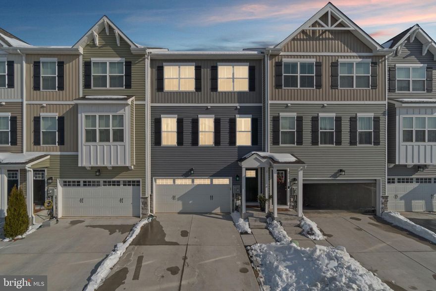 Like-new and beautifully maintained, this 3-bedroom, 2.5-bath home offers over 2,300 sq ft of stylish living space in the sought-after New Windsor community of Snader's Summit. All major systems are less than 4 years old, offering peace of mind for years to come. Thoughtful upgrades shine throughout, including luxury vinyl plank flooring, designer light fixtures, wainscoting, and striking accent walls. The spacious kitchen is a true showstopper, featuring a massive island, upgraded countertops and cabinetry, and a double oven—perfect for entertaining or everyday living. Upstairs, the generous primary suite boasts two closets and an upgraded spa-like shower, plus the convenience of second-floor laundry. Additional highlights include a dedicated home gym with rubberized flooring, a 2-car garage, and a fully fenced backyard with both a deck and a patio beneath—ideal for outdoor living. This home has been lovingly cared for and is impeccably neat and clean.  No other home in this area can compare!