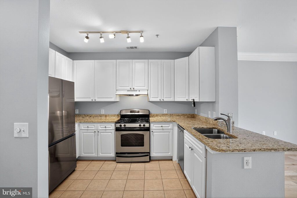 Photo of 501 Hungerford Drive #145, ROCKVILLE, MD 20850 (MLS # MDMC2203608)