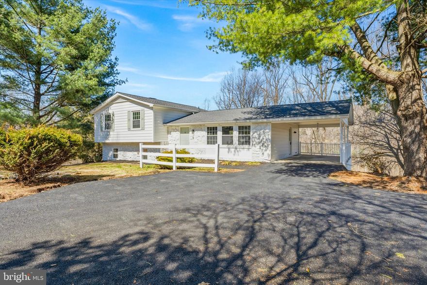 Check out this complexly updated home located in a prime Mt. Airy location.  This home includes a brand new roof,  a freshly repaved driveway, and a brand new HVAC system for maximum efficiency.  Placed at the end of a quiet cul-de-sac, with 1.23 acres of land, backing to trees, and a short trip to Historic Downtown Mt. Airy this property gives the best of tranquility and convivence.  The interior features new luxury, wide-plank flooring throughout the home.  The spacious kitchen provides tons of prep space, stainless appliances and new granite.  The upper level includes three bedrooms, all with new carpet.  The primary suite provides an updated full bath, and walks out to  a large deck overlooking the scenic view.  The lower has endless possibilities with walk out  access, a kitchenette, and a third full bath.  Easy access to major commuter routes, shopping, and dining.