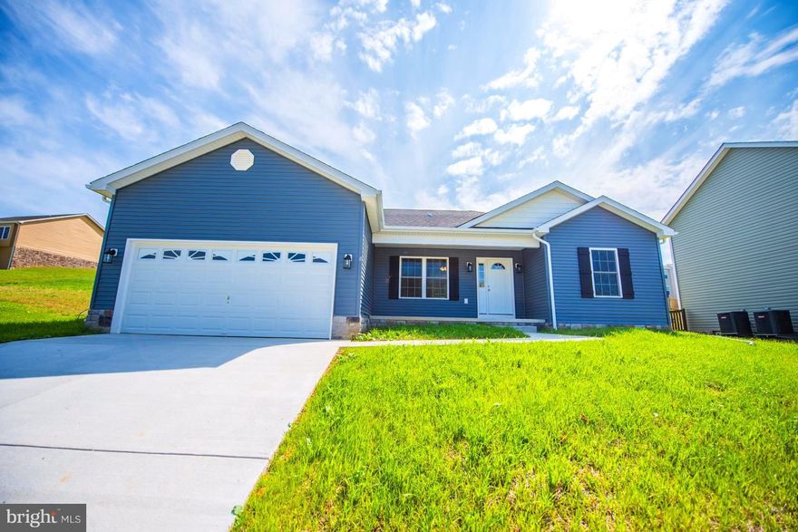 NEW CONSTRUCTION ON QUIET CUL-DE-SAC! Open Floor Plan with Woodgrain Finished, Durable LVT Flooring Throughout the Main Living Areas / Custom Cabinets with & Stainless Steel Appliances / Separate Laundry-Mud Room / Custom Two Tone Interior Paint / Conveniently Located in Upscale Development with Curb and Gutter & Sidewalks / REDUCED $10,000