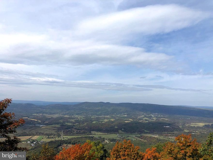 This property has some of the coolest VIEWS in the area.  Located in the ASHTON WOODS gated community, you can build your dream home/retreat and have absolutely astonishing VIEWS from every window and deck.  With well maintained roads & homes that are tucked back in the woods, driving through this neighborhood feels more like a National Forest and you are the only one there!  Just a 2 hour drive from DMV & easy access to US 48.  Looking for outdoor fun?  S Branch of the POTOMAC RIVER access is nearby, private access to thousands of acres of WV Managed Forest within walking distance, National Forests, Ski Resorts & WV outdoor adventures are just a short drive away.  Don't miss out on the opportunity to own these VIEWS,