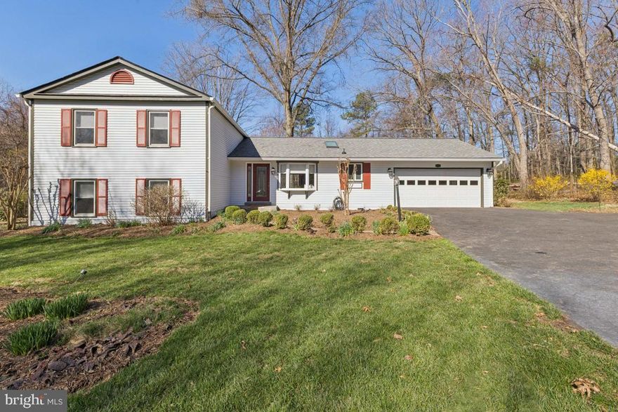 **Open Houses: Thursday 3/26 5-7; Sat 3/28 11-1; Sun 3/29 2-4** Meticulously maintained 4-bedroom, 2.5-bathroom home in the Folkstone community of Herndon, owned by same owners since 1987, situated on a generous 0.57 acre lot backing to open HOA green space. The exterior of the home is updated with an architectural shingle roof installed in 2023/2015 and freshly painted siding and trim (2026). The outdoor living areas are highlighted by a deck repainted in 2026 and an aggregate patio off the walkout basement, all surrounded by extensive, mature landscaping that provides seasonal color through a variety of perennials, flowering trees like Japanese dogwoods, and several fruit-bearing plants including a fig tree.The main level features a bright, open floor plan with hardwood floors refinished in 2023 and an updated maple cabinet kitchen complete with quartz countertops (2021) and high-end KitchenAid stainless appliances, including a dual-oven gas range. Natural light pours through a kitchen skylight (2023) and bay window (replaced between 2018-2025). The living areas are further enhanced by crown molding, updated baseboards, and a gas fireplace (serviced in 2026). More natural light and access to the deck come through the two sliding doors. Leading to the upper level is a refreshed staircase featuring new oak treads and modern railings installed in 2023.The upper level updates include fresh paint (2026), refinished hardwood floors and baseboards replaced in 2026. The primary suite offers a fully renovated ensuite bathroom with a frameless sliding door shower installed in 2019. Custom Italian ceramic accent tiles reflecting the love of home's gardens. Two additional bedrooms, one with a huge walk-in closet, share a second full bathroom that was completely renovated between 2017 and 2018. On the lower level, the finished walkout basement serves as a versatile recreation space with built-in shelves, wood-burning fireplace and Anderson sliding door to patio. The lower level is updated with new carpeting in 2021. There is a large fourth bedroom with proper English-style window egress and lovely powder room. The laundry room on this level was recently painted and fitted with new sheet vinyl flooring.The home’s major systems have been modernized for efficiency and peace of mind. The property was converted to gas fuel and now features a Trane HVAC system and a gas-fueled water heater, both installed in 2018 and is routinely maintained by All-Tech Services. This property is zoned for the prestigious Oakton High School pyramid including Carson Middle School and Crossfield Elementary School. It offers convenient access to route 28, Reston Parkway, West Ox Rd, Lawyers Rd, Dulles Toll Road and the Northern Virginia technology corridor.