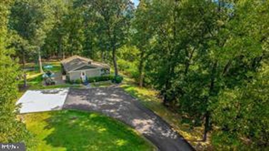 Very Private home with Amazing Million Dollar Views!!!!Very Nice perfect move in ready home with a huge deck to enjoy the peace and quiet and nature. Very nice upscale Kitchen with stainless steel appliances. #rd bedroom in walkout basement with huge walk in closet or could be office.  Wood stove to keep you  very warm during the winter and a nice sized rec room in the basement and a flat level walk out basement.  You  will love the 5 plus acres of  natures paradise !!!