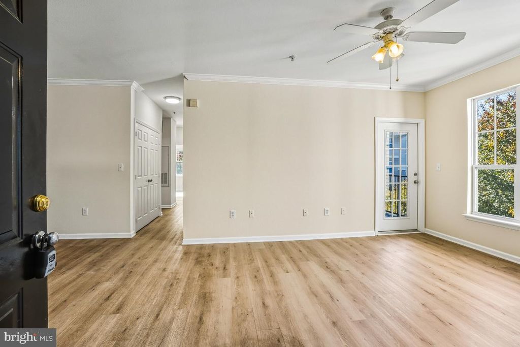 Photo of 13503 Kildare Hills Terrace #302, GERMANTOWN, MD 20874 (MLS # MDMC2205998)