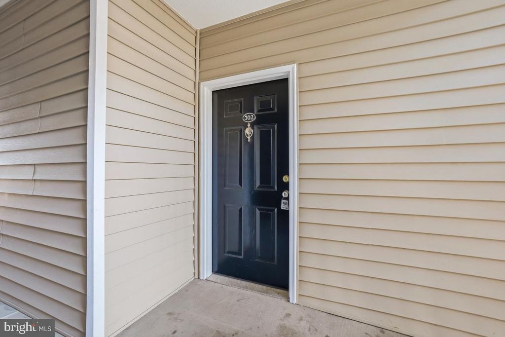 Photo of 13503 Kildare Hills Terrace #302, GERMANTOWN, MD 20874 (MLS # MDMC2205998)