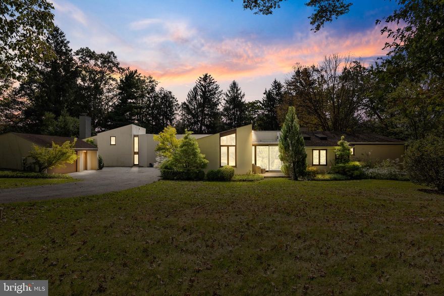 Welcome to 831 Amies Lane, a stunning contemporary set on 1.14 bucolic acres in highly desirable North Side Bryn Mawr. Beautifully renovated and expanded, this residence is situated on a tranquil cul-de-sac bordering historic Idlewild Farm Preserve. The bright, modern home connects seamlessly to its verdant landscape. Banks of windows, clerestories, and glass doors in nearly every room allow visual and physical flow to the private grounds, which are enhanced by multiple patios, a heated swimming pool, and the adjacent 26 acres of preserved land. With its gracious, open living spaces, the home offers a flexible floor plan with multiple living spaces that can function as a formal living room, family room, library, or office. The spacious dining room flows into the gourmet kitchen, with both spaces accessing the travertine patio through glass doors. The timeless kitchen designed by Varenhorst Architects received the prestigious Custom Home and Builder’s Watermark Grand Award for its design. The sophisticated chef’s kitchen features Bulthaup cabinetry; Gaggenau, Dacor, and Subzero appliances; and sylvan views of the private garden, pool, and Idlewild Farm beyond. The primary bedroom suite enjoys a meticulously designed walk-in closet and an elegant marble bathroom with soaking tub and large glass and marble shower. A private office with built-in shelving separates the primary suite from the two additional bedrooms and a bathroom on the main level. Additional flexibility is offered by the fourth bedroom and ensuite bathroom, which has exterior, independent access and could function as an au-pair or in-law suite. A family room with wood-burning fireplace connects the pool area to the powder room and kitchen, allowing for easy poolside entertaining. The basement and 2-car detached garage offer additional storage space. This Lower Merion Township residence is located in an award-winning public school district and is minutes away from several independent schools, downtown Bryn Mawr, the village of Gladwyne, and Suburban Square. It is close to all major commuting arteries, trains, and the Philadelphia airport. This extraordinary residence offers a truly outstanding contemporary design in an idyllic location. It is a rare opportunity for the discerning buyer.