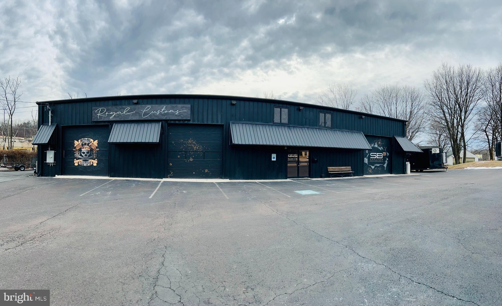 An exceptional opportunity awaits in this PRIME commercial property located in a high-traffic area with EXCEPTIONAL HIGHWAY VISIBILITY. This expansive 8,900+ square foot building offers two fully usable floors, providing ample space. The building currently houses a thriving and very profitable business specializing in automotive customization services, including window tinting, paint protection, vinyl wraps, and more. Sale includes the real estate, business, equipment and fixtures (as detailed). There is a front counter/customer greeting area, storage, and shelving, and 3 bathrooms; 1 with a shower. Conveniently located at a prime, signaled intersection with large electronic/panel sign facing Route 100.