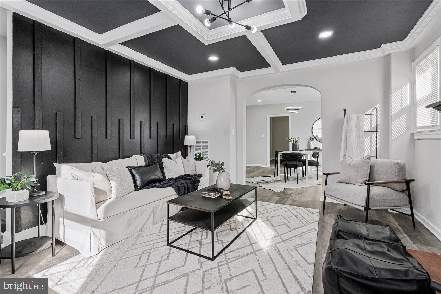 Welcome Home to 1007 Saint Charles Avenue! This Beautifully updated Cape Cod has the space you need to create a life you desire. Boasting an array of sleek finishes throughout and located in the sought after neighborhood of Ridgewood this 6 Bedroom, 5 Bathroom home has so much to offer! The main level offers an open concept layout featuring a spacious living room, dining area, kitchen, sunroom/mudroom, full bathroom and entry level bedroom. The chefs kitchen boasts S/S appliances, white shaker cabinets, Quartz counters with large waterfall island with seating, Pot filler above gas range and freestanding range hood, under counter built in wine fridge, built in drawer microwave and MORE! Livingroom offers a custom accent wall and coffered ceilings. Mudroom has a built in bench with hooks perfect for all your belongings! Upstairs you'll find 3 spacious bedrooms and 2 full bathrooms. The primary bedroom boasts an electric fireplace, custom coffered ceilings, and an en-suite bathroom with spa freestanding tub and separate stall shower with beautiful ceramic tile! Downstairs you'll find the basement has been finished to include an in-law-suite with a full kitchen, full bathroom and spacious bedroom. In addition there is a 6th bedroom and 5th full bathroom in basement and Rec Room that is perfect for entertaining! Basement has it's own exterior and interior entrance. All 5 bathrooms have been beautifully updated with new ceramic tile and all new bathroom fixtures. All new LVP flooring and carpeting throughout! Detached 2 car garage, large driveway for ample parking, covered front porch the perfect spot for relaxation and SO MUCH MORE!! Fenced in, spacious rear yard with stone patio the perfect spot for outside entertaining! This home is a gem and truly has it all!! Book your private showing today before it's gone!!