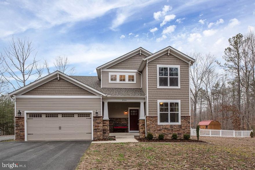 Enjoy benefits of New Contruction with NO wait. Beautiful floor-plan with main level master suite. Walk into a grand foyer with wide plank hardwood floors, large office, gourmet kitchen with granite and stainless steel appliances. Open floor-plan into family room. Master suite has a large walk-in closet and dream bathroom with double shower heads. Upstairs boasts 3 large bedrooms. Basement is Fully Finished and has 2 rooms that could be used as bedrooms or rec rooms. 1 full bathroom and large rec area for movie theater and entertainment. Property sits on over 5 acres, giving a secluded feel. Backyard has a 14 x 20 deck and 16 x 20 shed. Extended driveway with ample space for parking, cars or boats. Property also has electric hook up for a RV if desired.