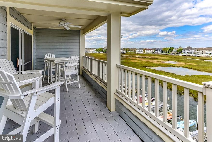 This beautiful 3BR/2BA end unit condo is in the Baywatch II Building overlooking the water and bird sanctuary in the fabulous community of Heron Harbour Isle.  It comes with boat slip #39 with a 7,500 lb lift. This unit is being sold furnished, is in pristine condition and has a lovely beach d cor. There is a large dining area flowing off the luxurious kitchen with breakfast bar.  The living area is very spacious and perfect for entertaining.  You will love the master bedroom overlooking the water with the nice master bath, and your family and friends will enjoy the other two large bedrooms.  One of the bedrooms has a private deck as well. There are upgrades throughout including new flooring.  There is a large deck off the living area that overlooks the water with magnificent sunset views and views of the fireworks at Northside Park.  Imagine yourself in this beautiful condo in one of the nicest communities in Ocean City.  Heron HarbourIsle is amenity rich with two outdoor pools, an indoor pool, a kiddie pool, fitness center, social room, sauna, locker room, two Har-Tru tennis courts, sidewalks and piers. Enjoy your boat, fishing, crabbing, kayaking and paddle boarding all directly out your back door, and make memories that will last a lifetime.  This unit is currently in the CB Vacation's rental mini-week program.  Buyers to honor the rentals and receive the rental income.