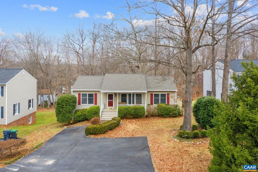 New roof, new water heater, one-level living, and so much more, all in the desirable Hollymead subdivision.  Property features hardwood floors throughout the main living area, a spacious front porch, and a large, 2-level back deck.  The sunroom features large windows and a gas stove for warmth, and allows plenty of sunlight to flow into the dining and living room areas.  The sunroom flows to a large upper level deck with bench seating.  Features continue with a finished walkout basement with a large family room, a bonus room, full bathroom, a 4th bedroom, and a radon mitigation system.  The property backs up to a wooded common area, nice for some privacy.  Enjoy walking trails and a nearby lake.  Conveniently located to NGIC, DIA, plenty of shopping, and the Charlottesville Airport.  Ting fiber internet plans are available.,Formica Counter,Wood Cabinets,Fireplace in Sun Room