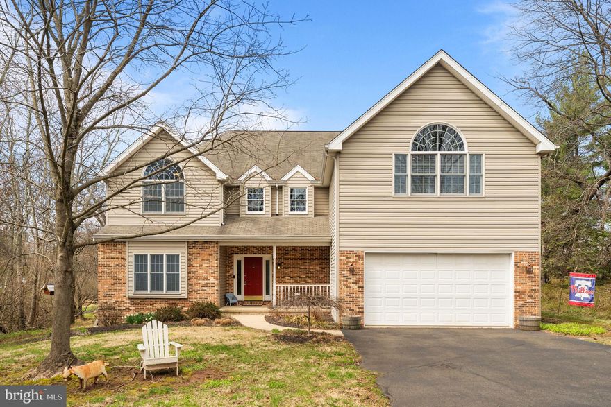 Welcome to 880 Troxel Rd!!  This 5-bedroom 2.5 bath single family colonial is set on .90 acres in Towamencin Township.  It features; An eat-in kitchen with 42” cabinets, tile backsplash, center island with two refrigerator drawers, stainless steel appliances, oversized sink and recessed lighting, family room with wood burning fireplace offering a brick surround, hardwood flooring and sliding glass door to the oversized Ipe deck, dining room with crown molding, chair rail and hardwood flooring, formal living room with crown molding and hardwood flooring.  Additional features of the main floor include the laundry room with utility sink, powder room and access to the attached 2-car garage.  The second floor boasts the light and bright main suite with vaulted ceiling, palladium window, walk-in closet with built-ins as well as two additional closets, access to the full main bath with jetted tub and double bowl vanity as well as access to the office / 5th bedroom.  There are also 3 additional bedrooms with ceiling fans as well as a jack and jill bathroom to round out the second floor.  This home also offers a fully finished basement with game room as well as additional storage space.  Don’t miss this opportunity.  Home is easy to show and ready to go!!