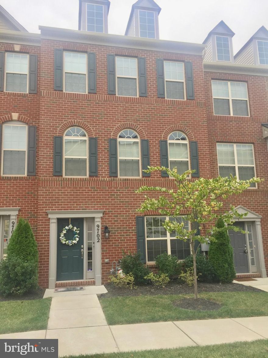 Gorgeous, home in sought after Woodmore Towne Centre located near Wegmans, restuarants, gyms, and etc. This 3 level  town home has 3 bedrooms, 2 full/2 half baths; 2 car garage; hardwood floors on main  level and kitchen; gourmet eat in kitchen w/ granite countertops, stainless steel appliances; with a new washing machine and dryer.  Ceilings fans are in every bedroom,  also check-out the custom made fireplace wall with an electric fire place, there is a huge walk-in shower in the Master Bedroom, with a private toilet room.  This won't last long!! Home has already been appraised.