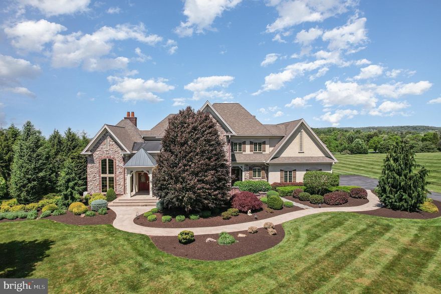 Welcome to 621 Southridge Dr, an unparalleled gem nestled within the esteemed West Shore School District. This custom-built estate, crafted by the highly sought-after Heritage Builders, stands as a testament to exquisite design and impeccable craftsmanship. From the moment you step inside, you're greeted by an aura of sophistication and luxury. Every corner of this home boasts meticulous attention to detail, with stunning trim work and fine craftsmanship elevating the ambiance to unparalleled heights. With primary bedroom suites thoughtfully positioned on both the first and second floors, this residence offers ultimate flexibility and convenience for modern living. The open floor plan is highlighted in the family room where architectural elegance takes center stage with its elevated tray ceiling. This striking feature adds depth and dimension to the space, creating an atmosphere of grandeur and warmth. Whether you're cozying up by the fireplace on a chilly evening or enjoying lively conversations with loved ones, the family room serves as the perfect backdrop for unforgettable moments. Prepare to indulge your culinary passions in the gourmet kitchen, where culinary excellence meets contemporary design. Open to the eat-in dining area and adorned with surrounding windows, the kitchen is bathed in natural light, creating a warm and inviting atmosphere. Equipped with top-of-the-line appliances, custom cabinetry maximized with pull out storage, ample granite countertop space, and limestone backsplash, this culinary haven is every chef's dream come true. Formal dining room and living room are versatile for your needs. First floor laundry with a shower for cleaning up messy kids or pets. Two staircases to access the 2nd floor living space. But the allure doesn't end there. Descend to the finished lower level, where luxury meets entertainment. A professional bar sets the stage for unforgettable gatherings, while a full bathroom with changing area, large rec room, and temperature-controlled wine room offer endless opportunities for leisure and indulgence. Situated on an expansive 3.77-acre lot, privacy reigns supreme, providing a serene retreat from the hustle and bustle of everyday life. Step outside to discover a haven of relaxation and entertainment, complete with an in-ground heated pool,  partially covered multi-level patios, perfect for hosting gatherings or simply unwinding in style. Prepare to be impressed by the sheer magnitude of storage space this property offers, ensuring that every belonging finds its place effortlessly. Experience the epitome of refined living at 621 Southridge Dr, where every detail is meticulously curated to elevate your lifestyle to new heights. Welcome home to luxury, welcome home to serenity.