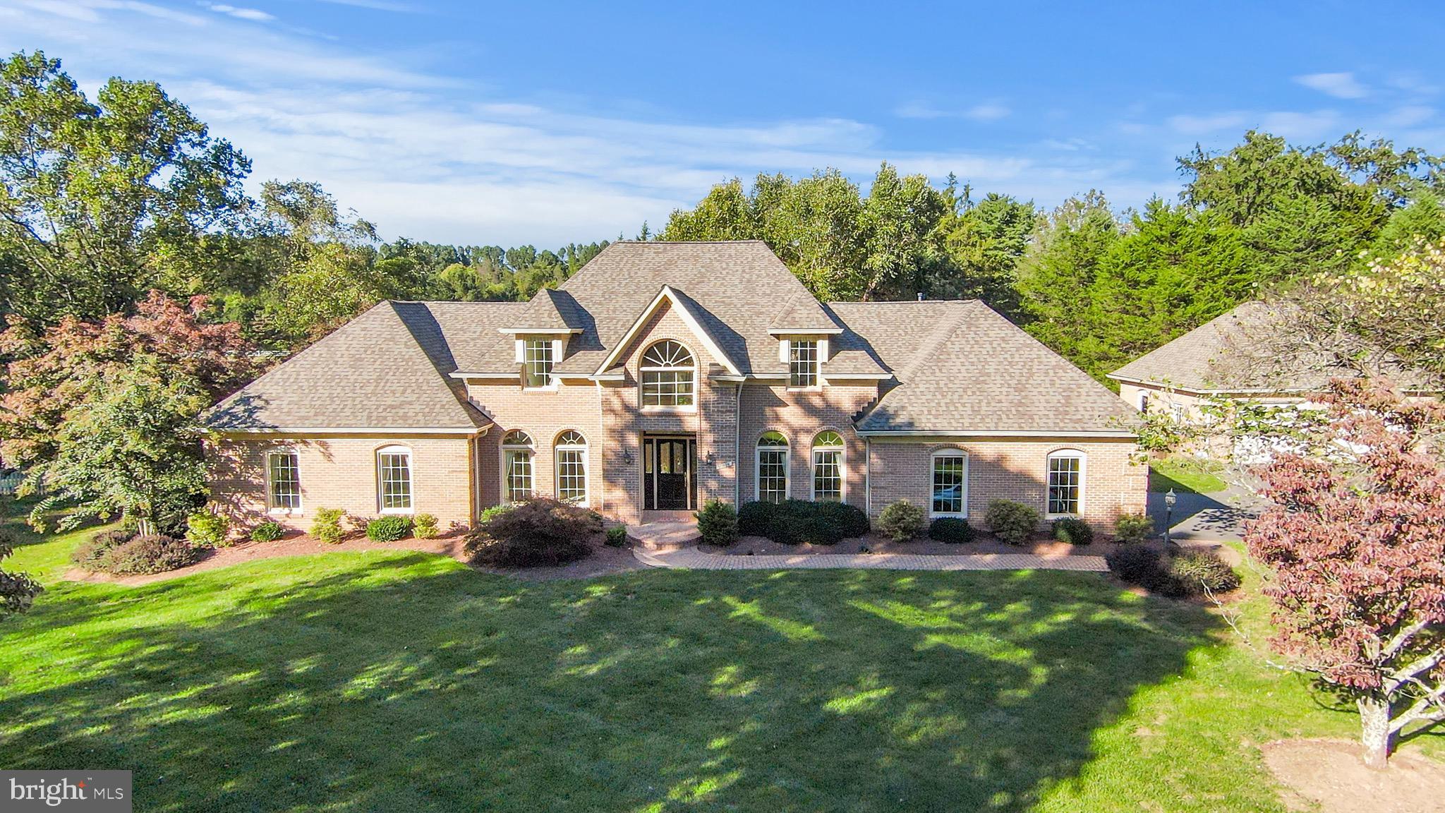 10928 WOODLAND FALLS DRIVE