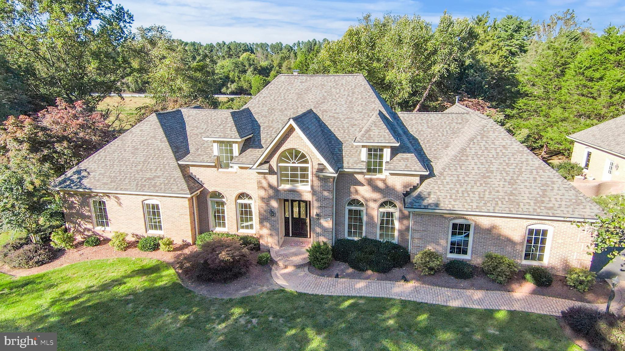 10928 WOODLAND FALLS DRIVE