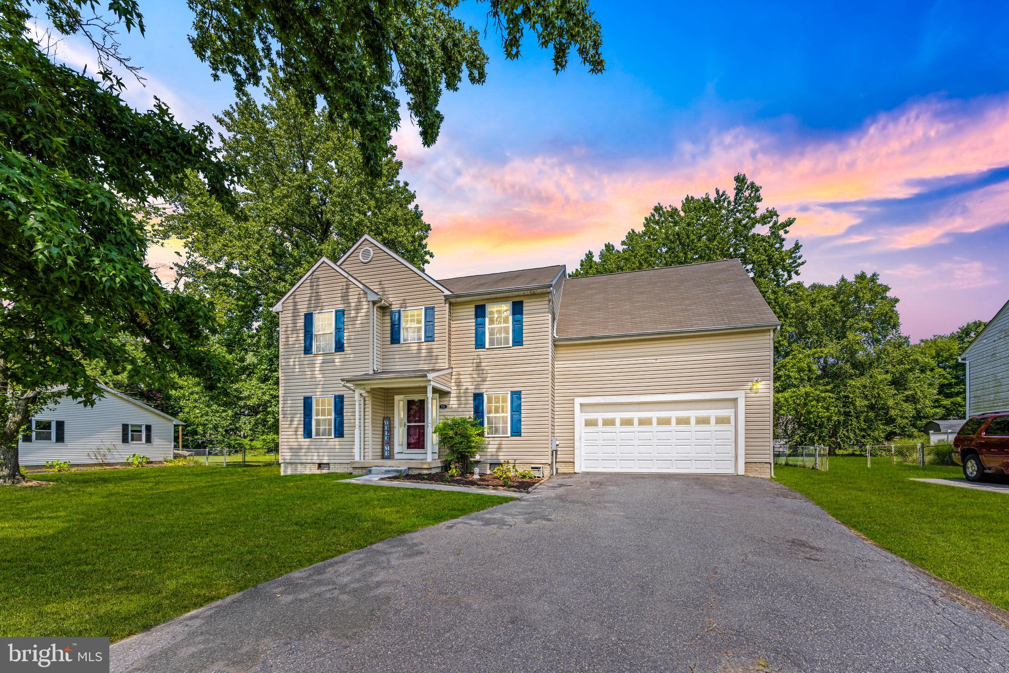 Welcome to this beautifully maintained 5-bedroom, 2.5-bath Colonial located in the water-privileged Cloverfields community on the Chester River! Situated on a .37-acre lot, this 2,418 sq ft home offers spacious living inside and out, with major system upgrades scheduled for buyer peace of mind—new 30 yr architectural roof (2025) and new water heater (2025) to be installed by settlement. The main level features a large eat-in kitchen with center island, updated Frigidaire Gallery stainless steel appliances (2023), and double pantry, which flows seamlessly into a bright family room with hardwood flooring and gas fireplace. A formal dining room and office with crown molding and chair rail, plus a convenient laundry/mudroom with a new utility sink and faucet (2024) complete the first floor. Upstairs, you'll find 4 generously sized bedrooms plus a large 5th bedroom/bonus room, including a primary suite with walk-in closet and private bath. Recent updates include fresh paint throughout (2024), new carpet in dining room, office, and stairs (2024), new light fixtures and ceiling fan (2024), and LED recessed lighting throughout. 9 ft ceilings, hardwood, and ceramic tile add to the appeal. Enjoy outdoor living with a concrete patio, freshly landscaped yard with new mulch (2025), and a backyard shed for extra storage. The oversized two-car garage offers ample space for parking, storage and a workshop. The Cloverfields community offers a long list of amenities including a private marina with boat ramp and rental slips, clubhouse, pool, private beach, basketball courts, tot lot, fishing pier, horseshoe pits, and picnic pavilions—all for a low annual HOA fee of $200 (additional fees apply for marina and clubhouse rental). Located just minutes from the Chesapeake Bay Bridge, this home provides easy access to Annapolis, Baltimore, D.C., and all that Kent Island has to offer—walking/bike trails, restaurants, schools, and parks. Don’t miss the opportunity to live in this vibrant waterfront community—schedule your private showing today!